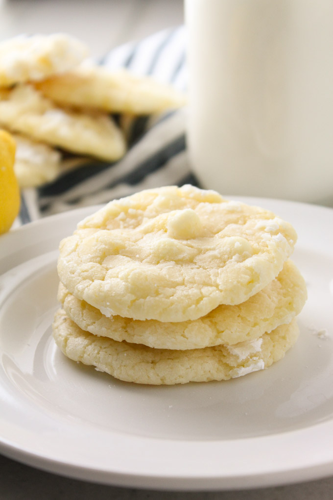 Lemon Crinkle Cookies- a classic chewy lemon cookie made with fresh lemon juice & zest. Plus white chocolate chips!