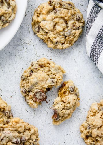 Texas Ranger Cookies-chocolate chip, oatmeal, rice cereal & coconut! These are filled with lots of good stuff. Easy & delish! via bakedinaz.com #cookie #texascookierecipe #chocolatechipcookie #coconutcookies #dessert