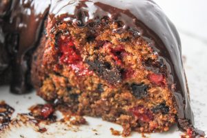 Cherry Chocolate Chip Bundt Cake- this easy from scratch bundt cake is bursting with cherries and chocolate chunks! Finished off with a sweet chocolate ganache. | via bakedinaz.com #bundt #cake #cherry #chocolate #scratch #valentines #dessert